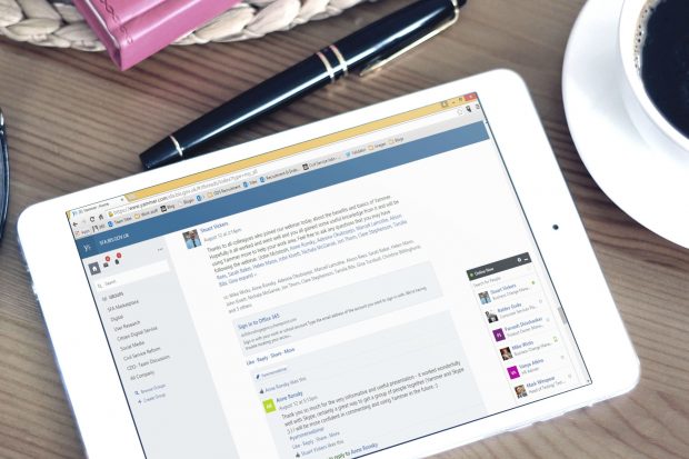 ipad on table showing a random Yammer page