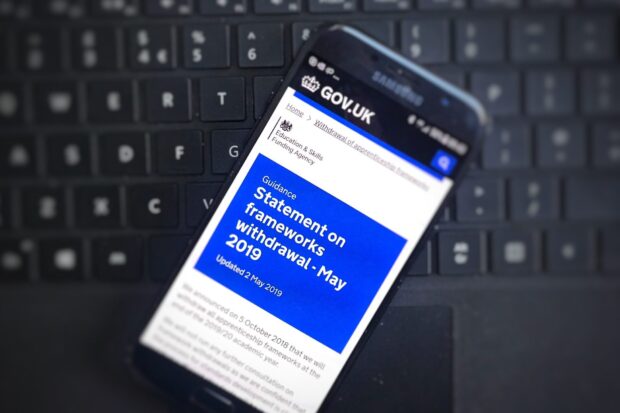 mobile phone screen showing Gov.uk guidance page open on , statement on frameworks withdrawal-May 2019