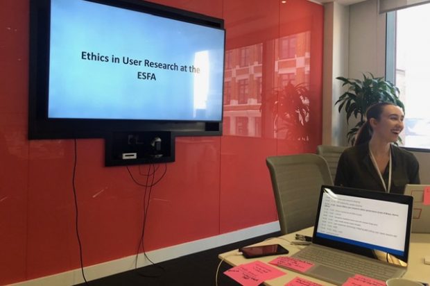 User researcher Lydia presenting a meeting on ethics in user research at the ESFA