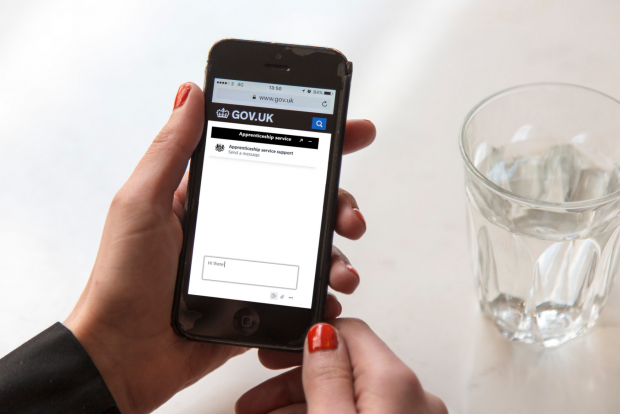 mobile phone displaying the apprenticeship service web chat box on screen
